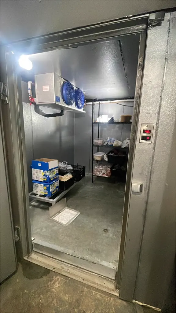 Dual-fan evaporator in a commercial cooler